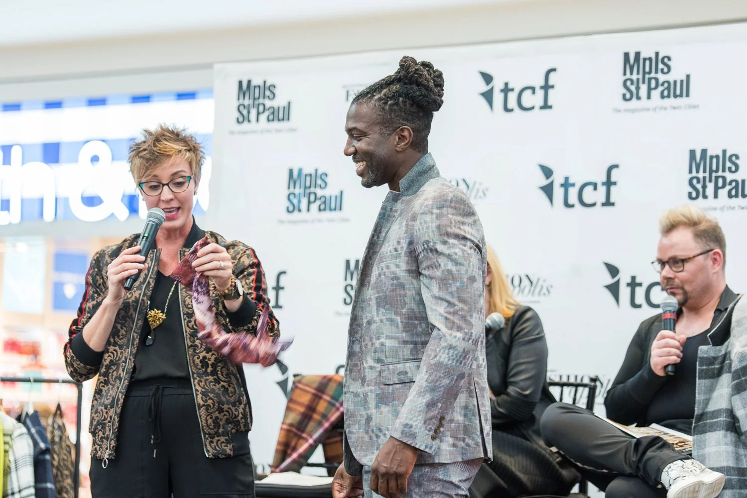 Male model walks the catwalk at British inspired fashion event