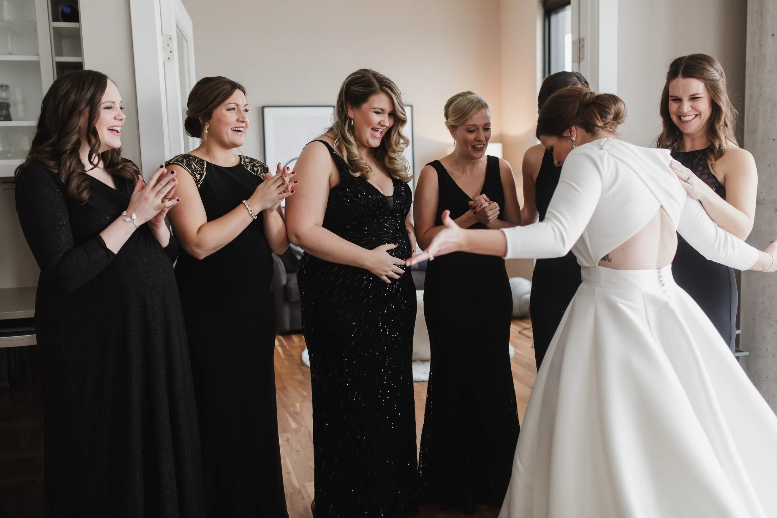 bridesmaids in black formal attire