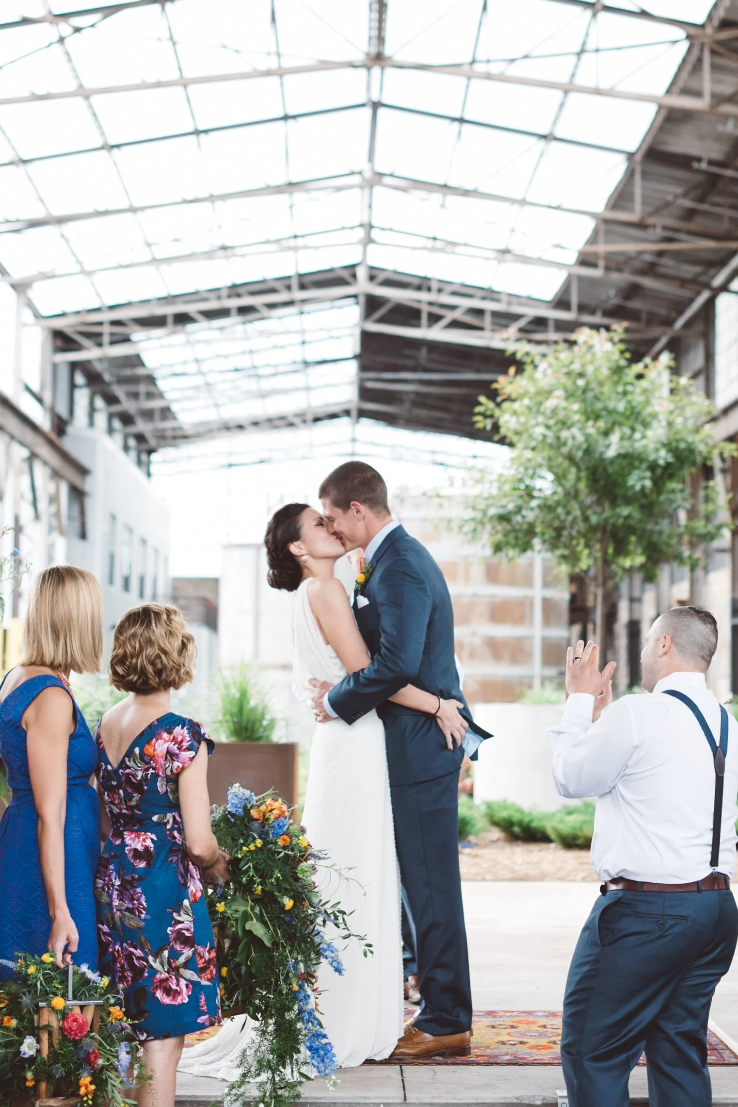 kiss at Bauhaus Brew Labs Wedding