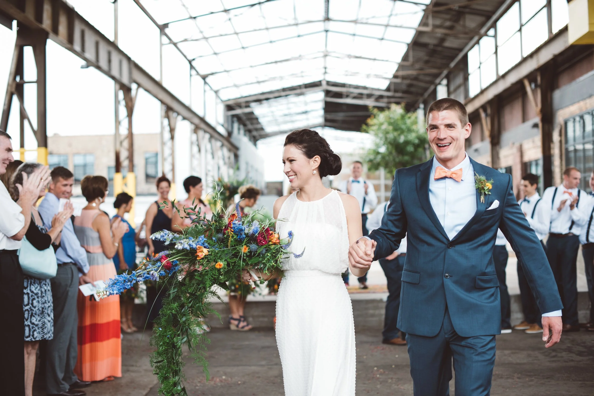 bride and groom exit Bauhaus Brew Labs Wedding ceremony