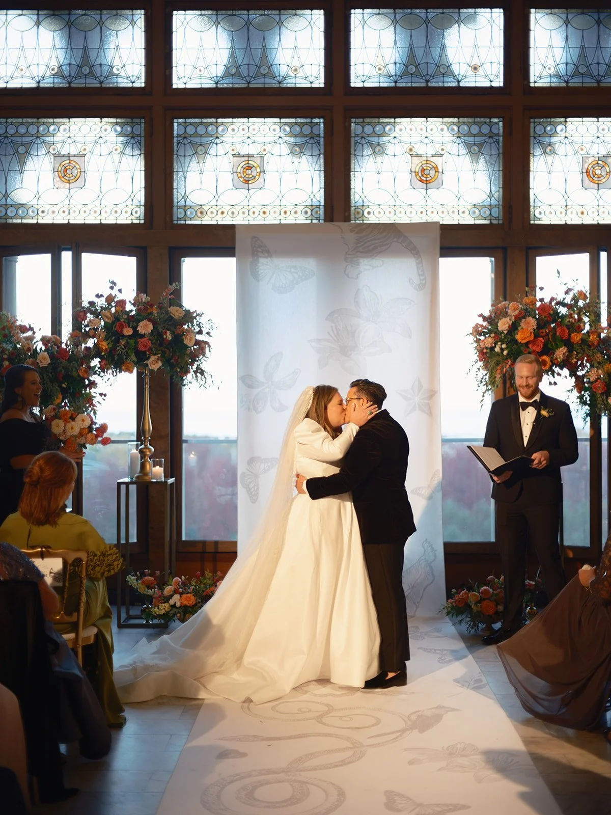 The kiss during a wedding ceremony at a Chicago Athletic Association wedding - Rocket Science Events