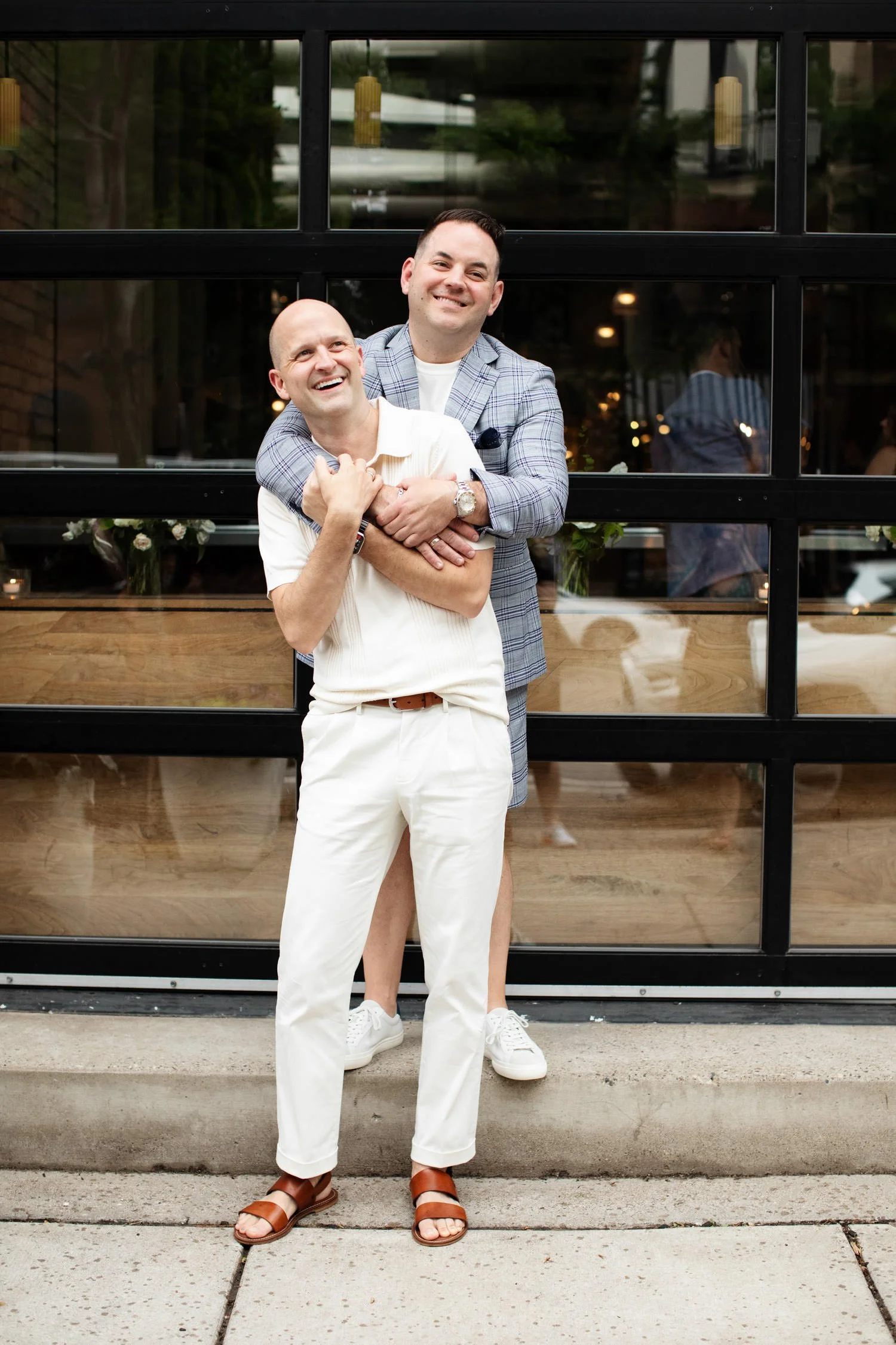 Couple portrait in front of the rehearsal dinner restaurant. Minneapolis rehearsal dinner, Spoon and Stable restaurant, Planned by Rocket Science Events.