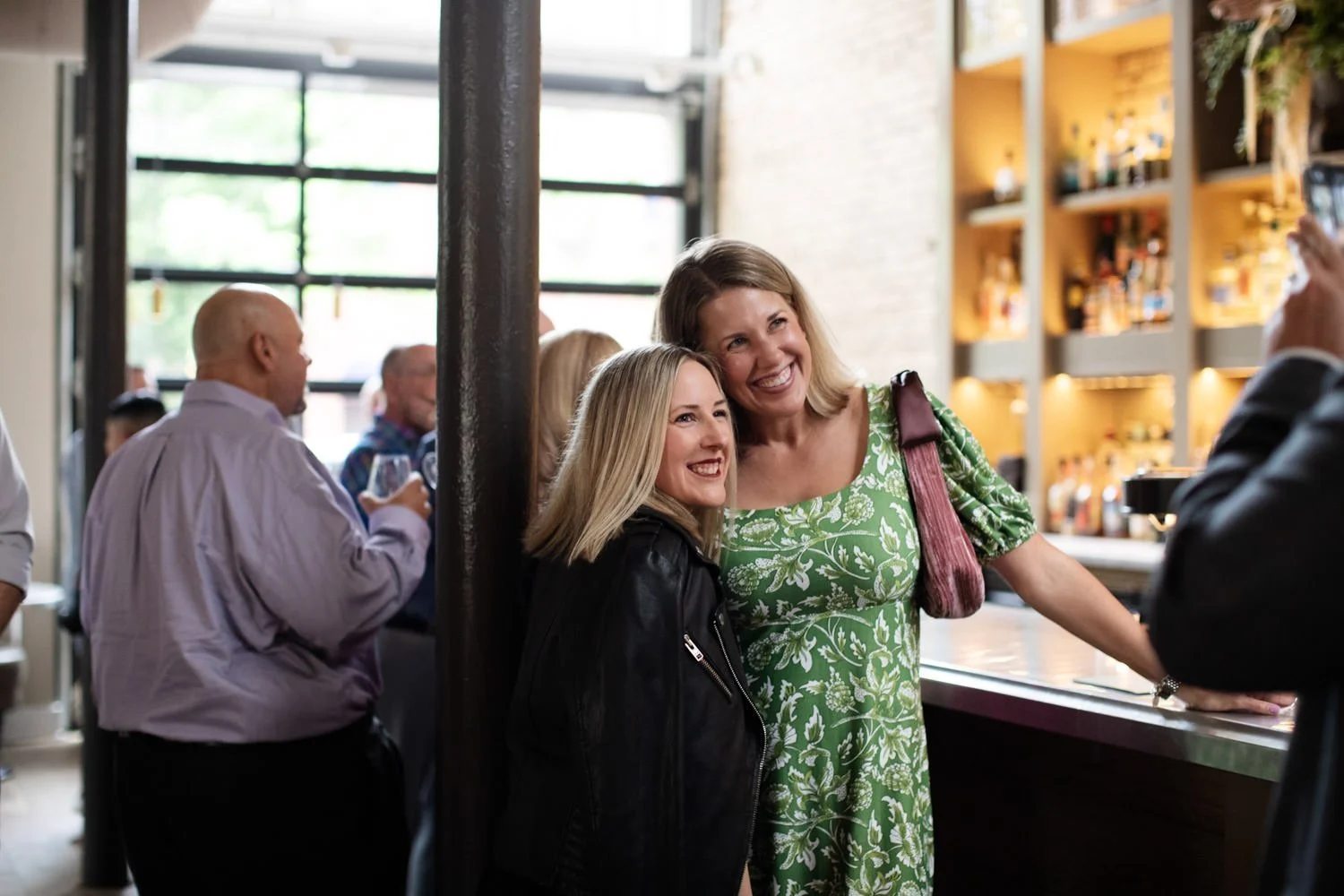 Guests at rehearsal dinner enjoying time together. Minneapolis rehearsal dinner, Spoon and Stable restaurant, Planned by Rocket Science Events.