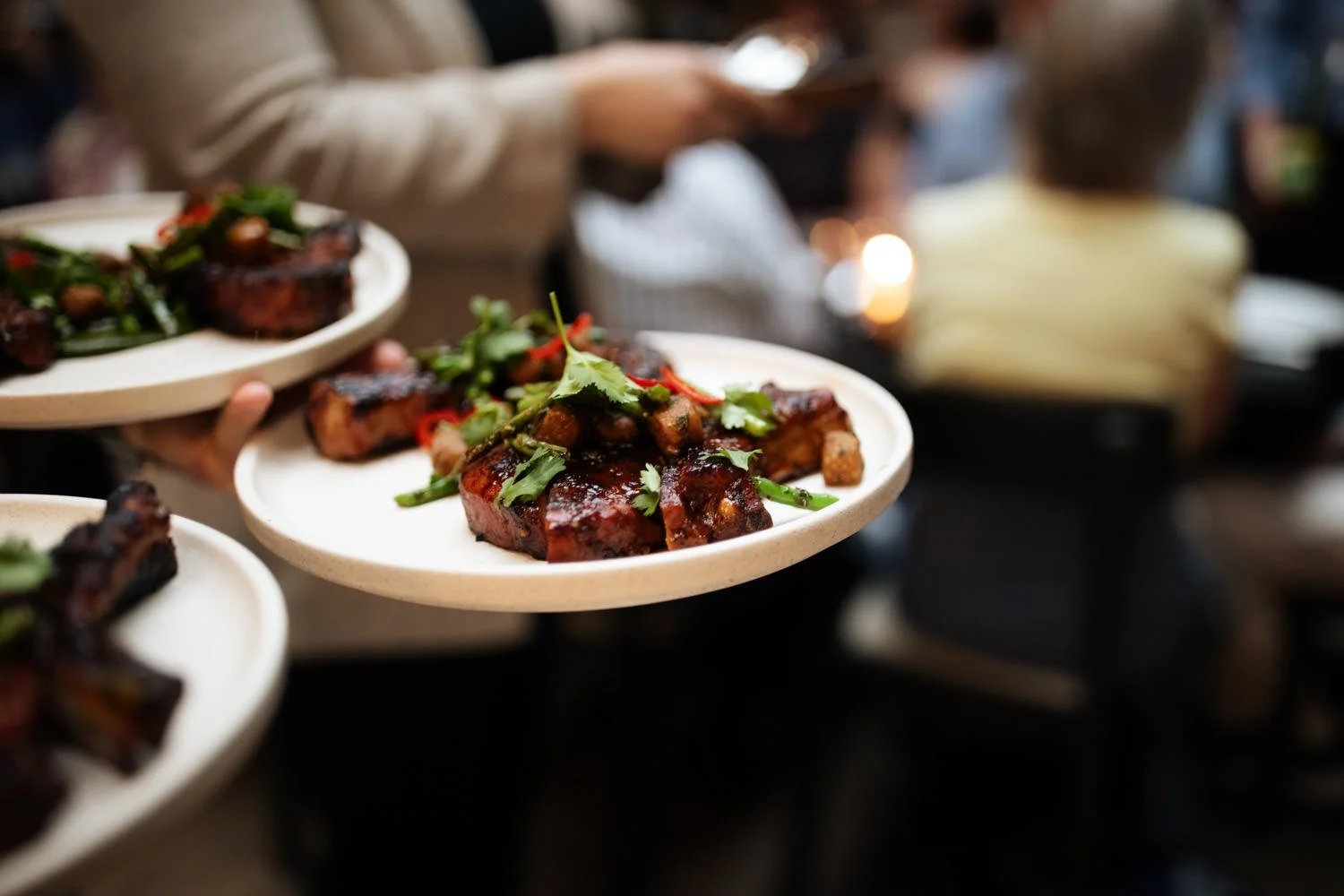 Rehearsal dinner of tasty pork ribs prepared by James Beard award-winning chef, Gavin Kaysen. Minneapolis rehearsal dinner, Spoon and Stable restaurant, Planned by Rocket Science Events