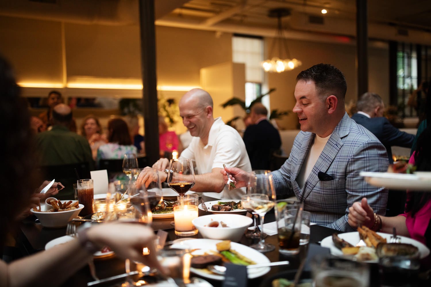 Guests enjoying the Rehearsal dinner prepared by James Beard award-winning chef, Gavin Kaysen. Minneapolis rehearsal dinner, Spoon and Stable restaurant, Planned by Rocket Science Events