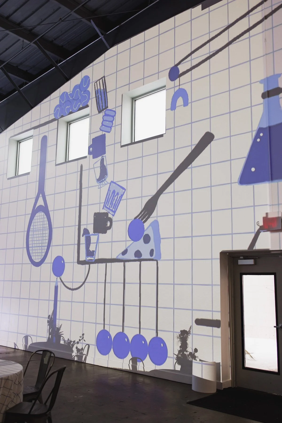 Rube Goldberg machine projection wall at Minneapolis Bar Mitzvah planned by Rocket Science Events