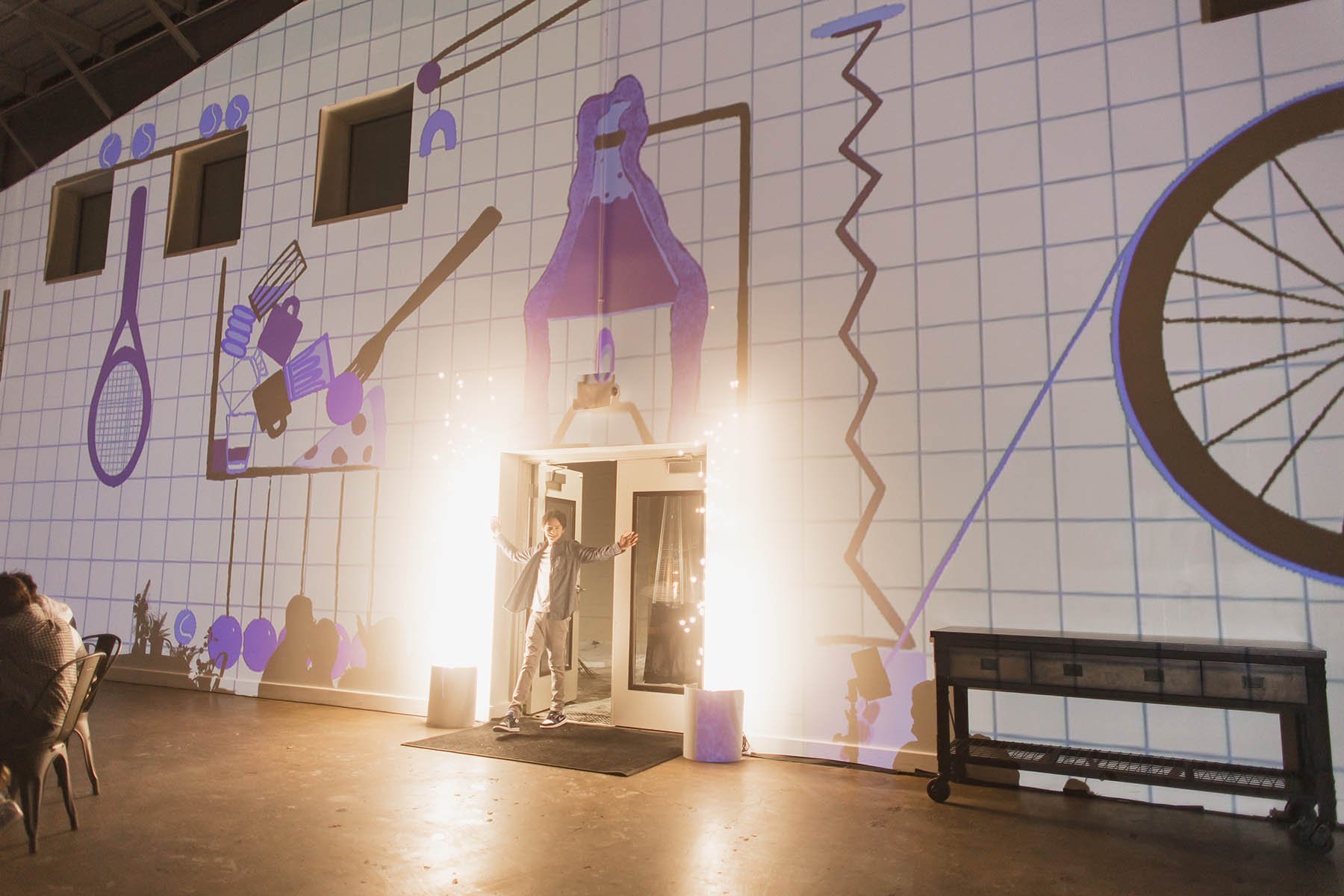 Bar Mitzvah grand entrance in front of a video wall, designed by by Minneapolis event planner Rocket Science Events