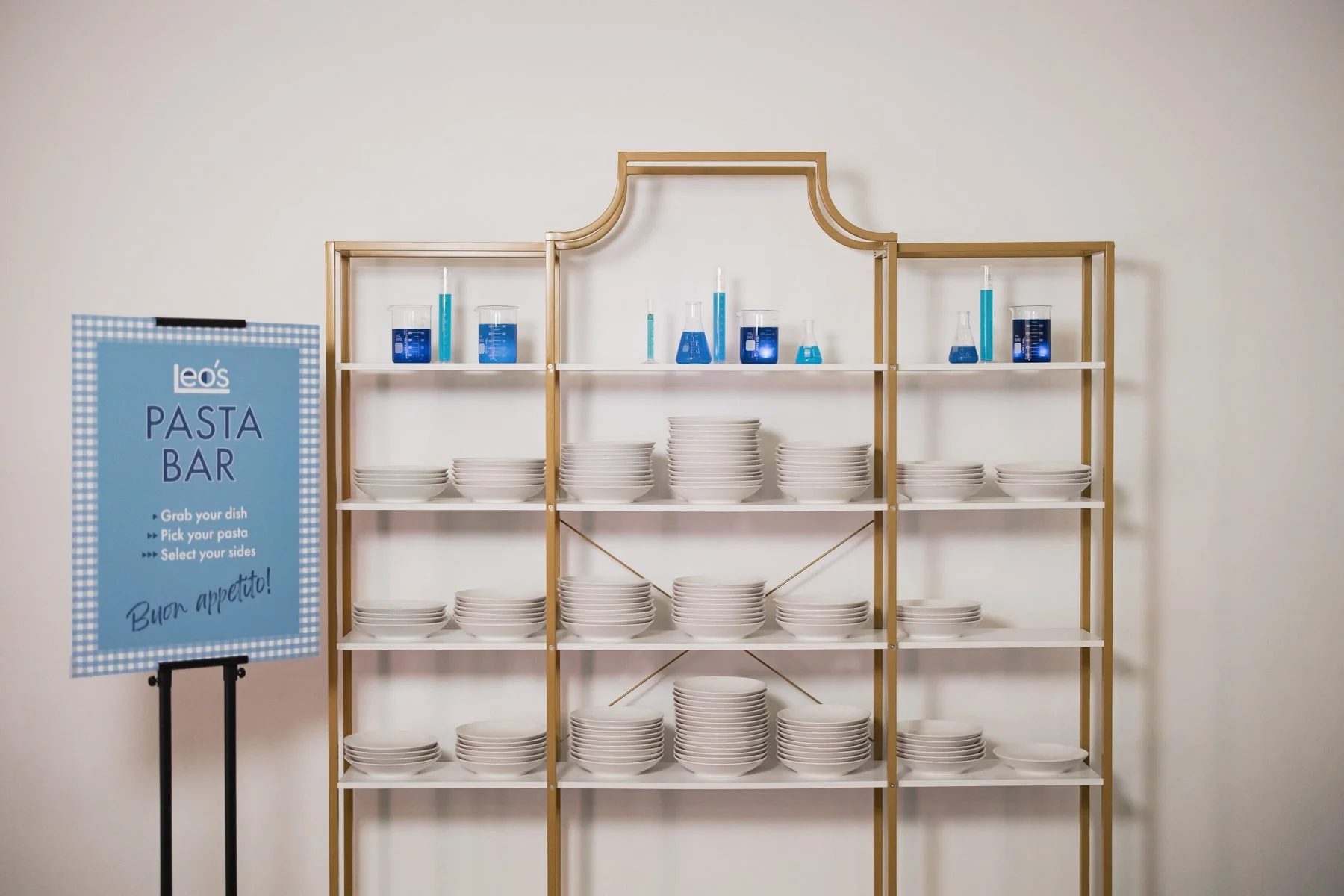 Pasta bar display of plates and bowls at a Minneapolis Bar Mitzvah planned by Rocket Science Events