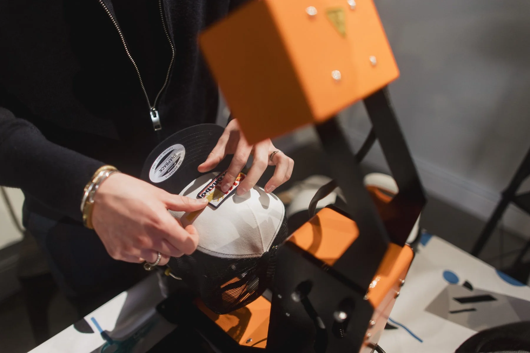 Custom trucker hat station at a Minneapolis Bar Mitzvah planned by Rocket Science Events