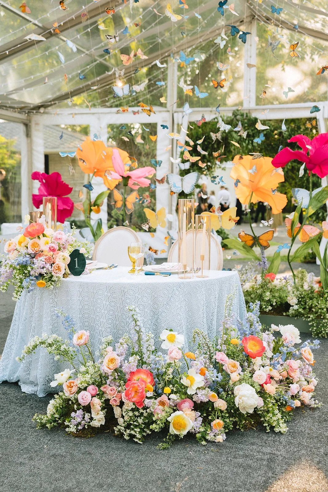 Whimsical Garden Wedding Design with Colorful Florals and Butterfly Details