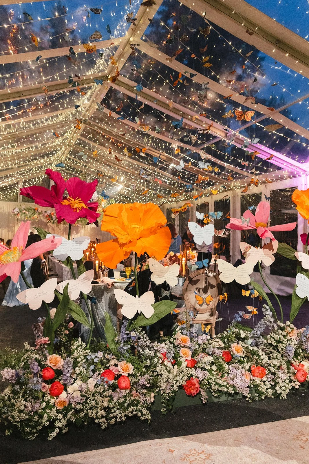 whimsical garden wedding reception twinkle lights clear tenet rocket science events