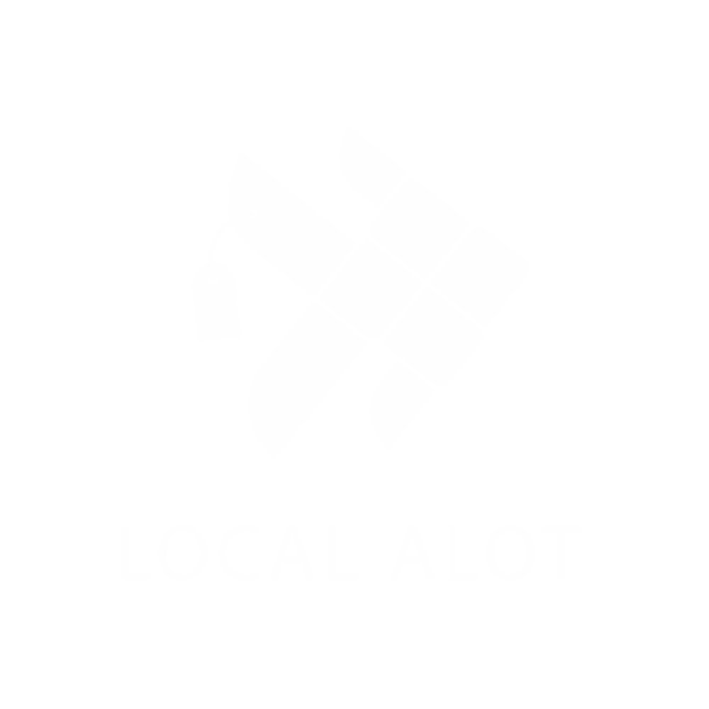 A logo with a stylized white hand holding a candle on a black background, with the text "LOCAL ALOT" below.