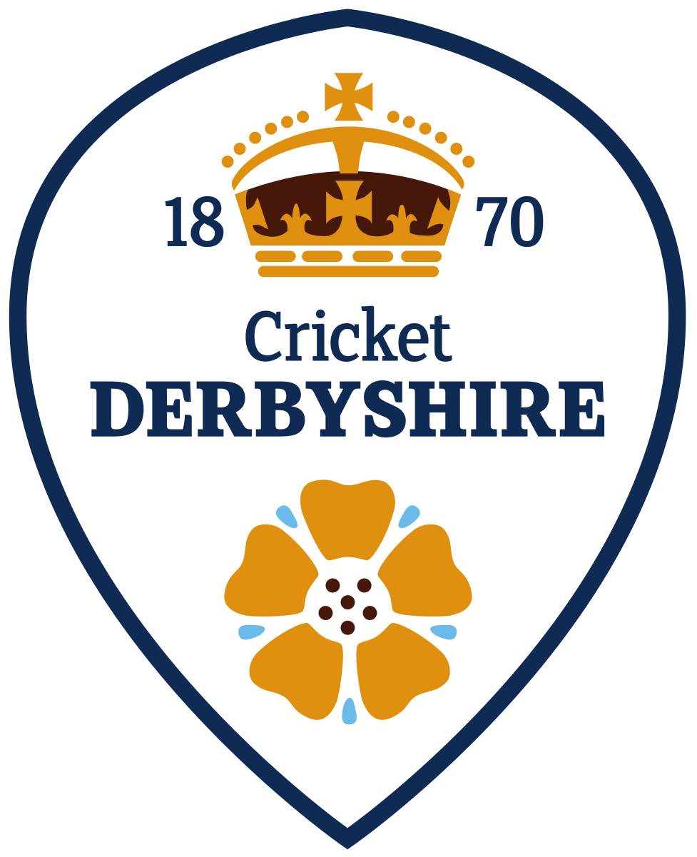 Cricket Derbyshire emblem featuring a crown at the top, the year 1870, the words 'Cricket Derbyshire' in the middle, and a stylized flower at the bottom.
