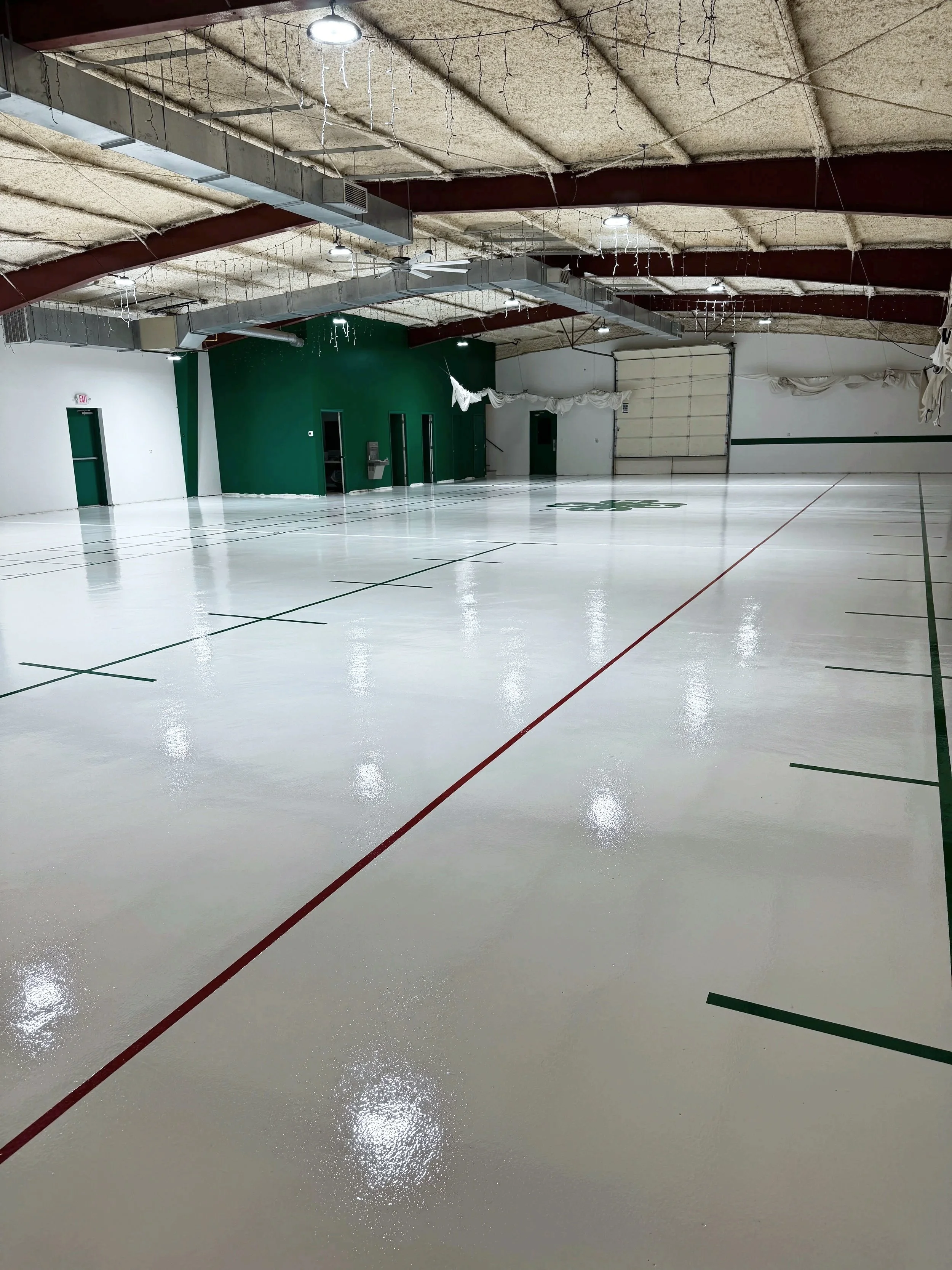 “Overall view of the Helena 4-H building with a Sherwin-Williams Macropoxy epoxy floor and freshly painted walls.”