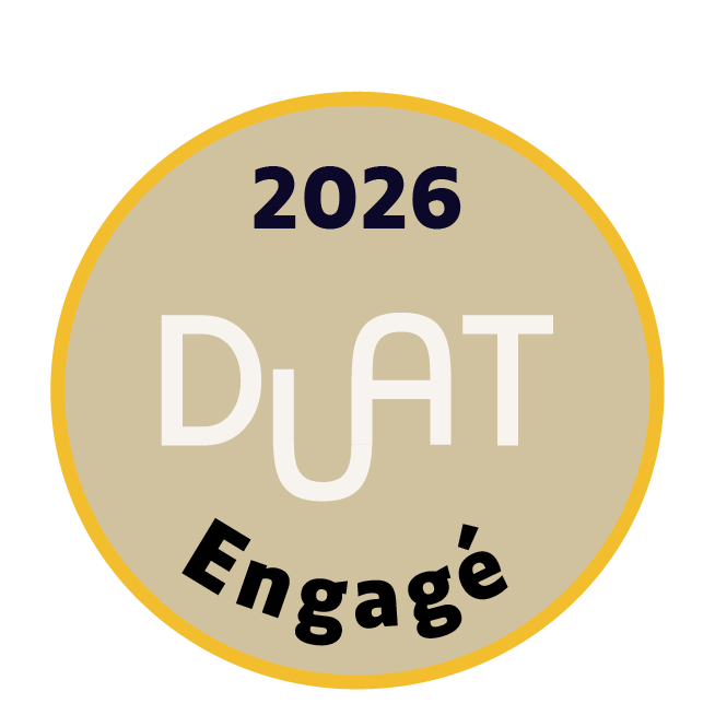 Circular badge with a gold border, beige background, and black, white, and navy text reading "2026 DAT Engage".