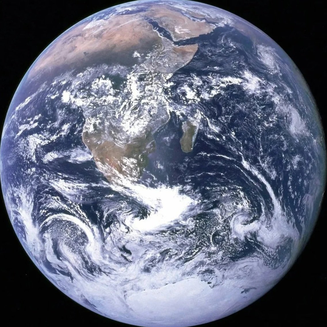 A satellite view of Earth showing North America, South America, and parts of the Atlantic and Pacific Oceans.