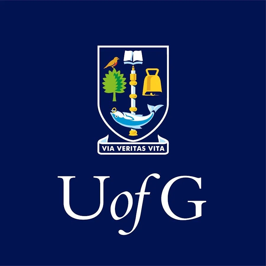 University of Glasgow emblem featuring a shield with symbols of a bird, tree, bell, fish, and book, and the university's motto "VIA VERITAS VITA." The background is dark blue.