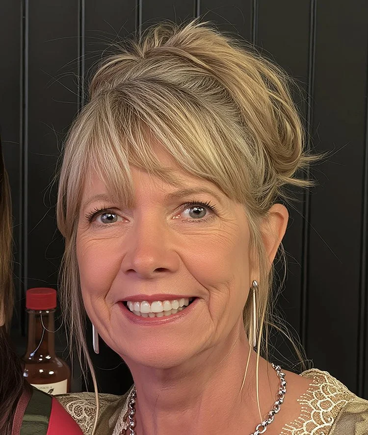Silhouette of a person's head and shoulders against a white background.