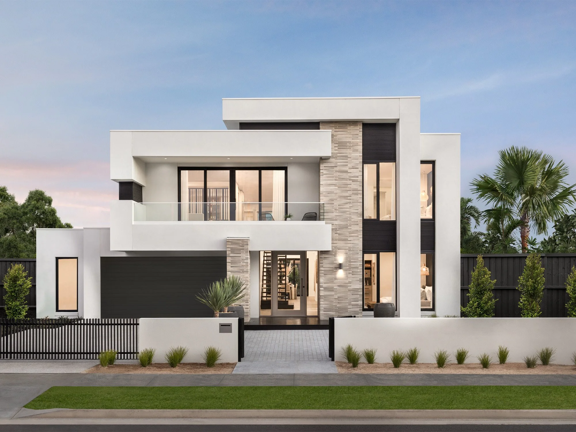 Modern two-story white house with large windows, a balcony, and landscaped front yard.