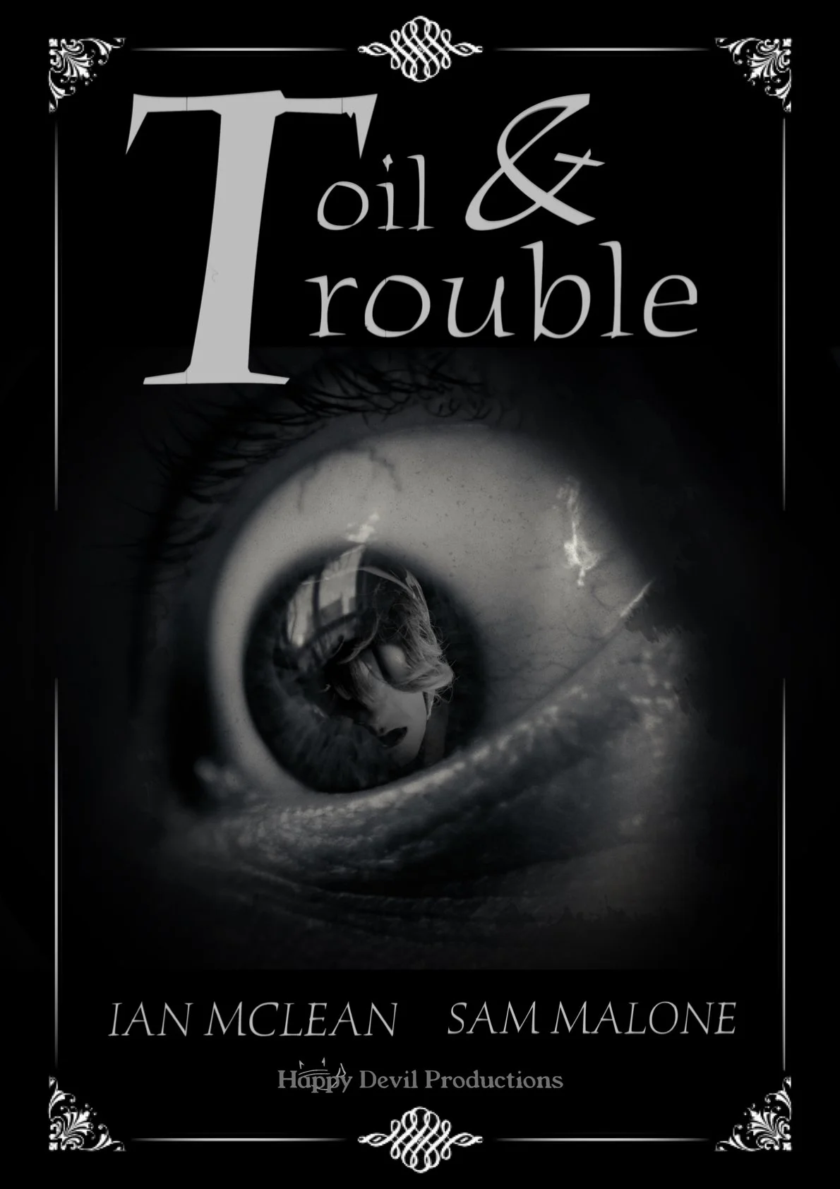 Movie poster in black and white for 'Toil & Trouble' featuring a close-up of a human eye with a reflection of a person inside the iris.
