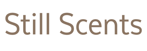 Text that says "Still Scents" with a brown font on a plain background.