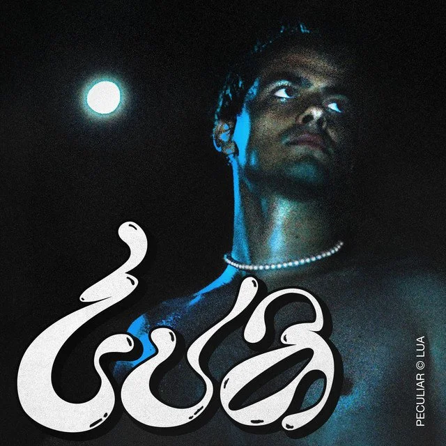 A man with dark skin and short hair is gazing upward against a dark night sky illuminated by a full moon. He wears a pearl necklace, and stylized white Arabic text overlays the lower part of the image.