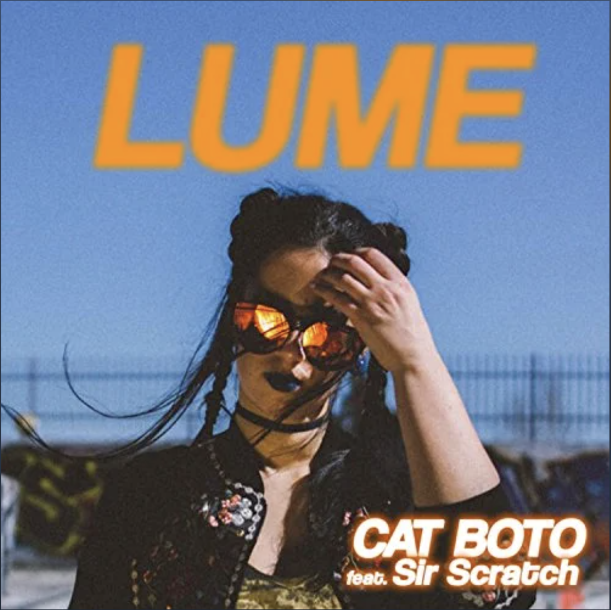 A woman with braids wearing sunglasses with reflections of an orange sunset, touching her forehead, with a blue sky and fence in the background. Text overlays say 'LUME' at the top and 'CAT BOTO feat. Sir Scratch' at the bottom.