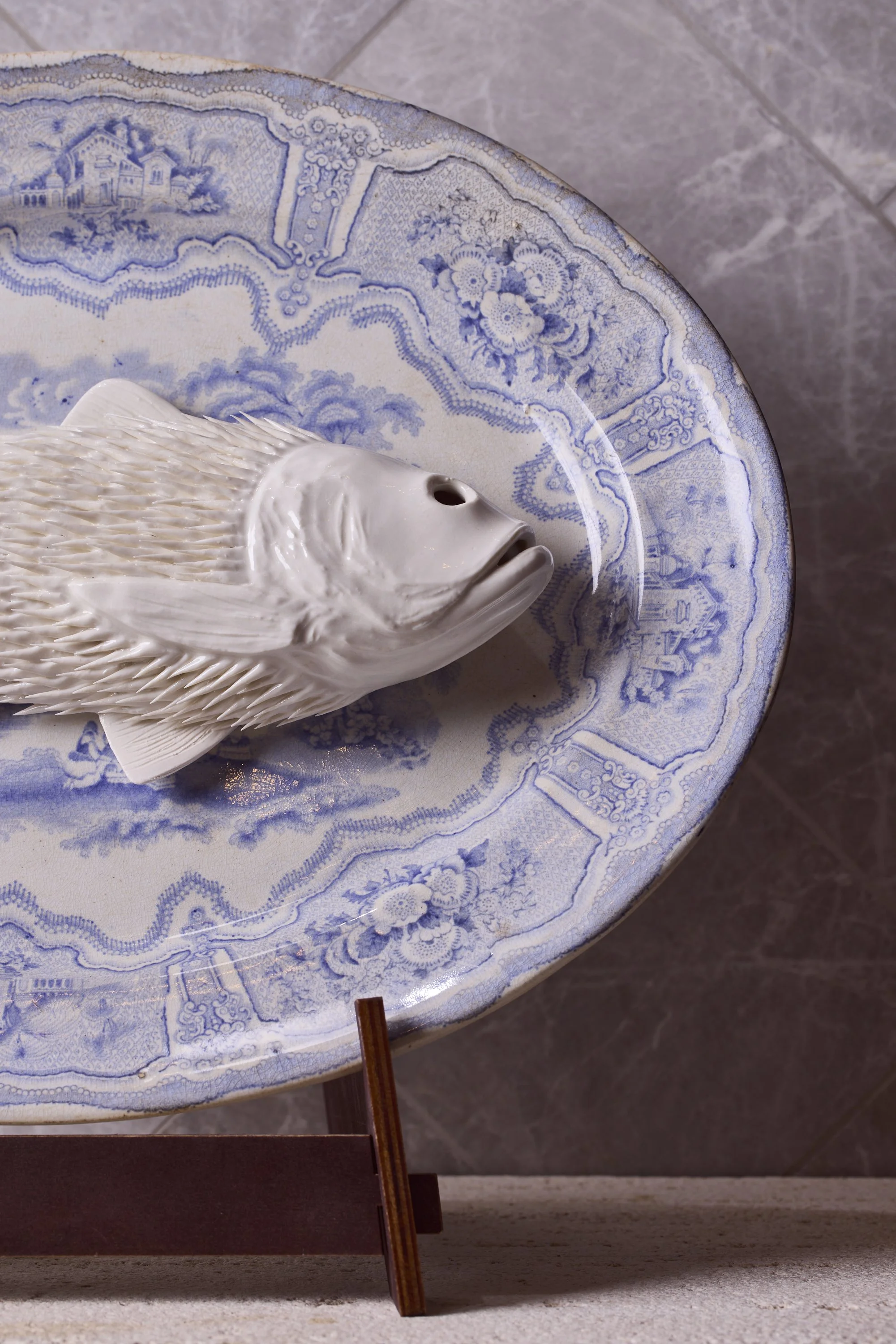 Detail of Ikuko Iwamoto' porcelain work. I ate lots of plastics, and now I am your dinner. Enjoy! QEST