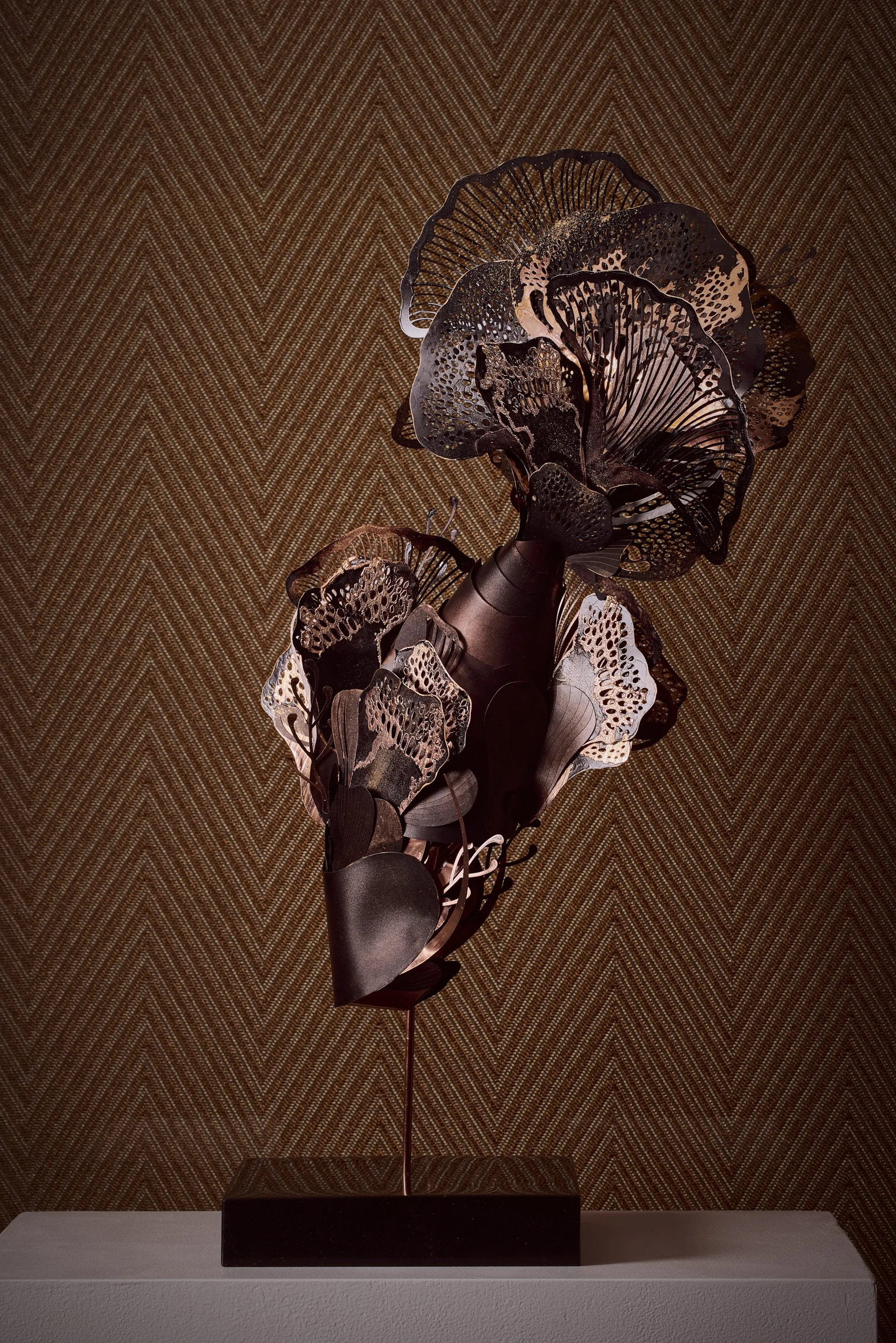 Detail of Sedara by Lisa Lloyd. Electroplated Yupo paper, Copper Sheets, Nara Paper, acrylic paint, alcohol inks, solid marble base. QEST Scholar.