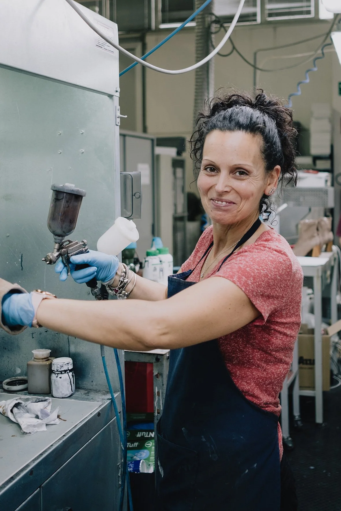 worker finishing handmade leather  shoes