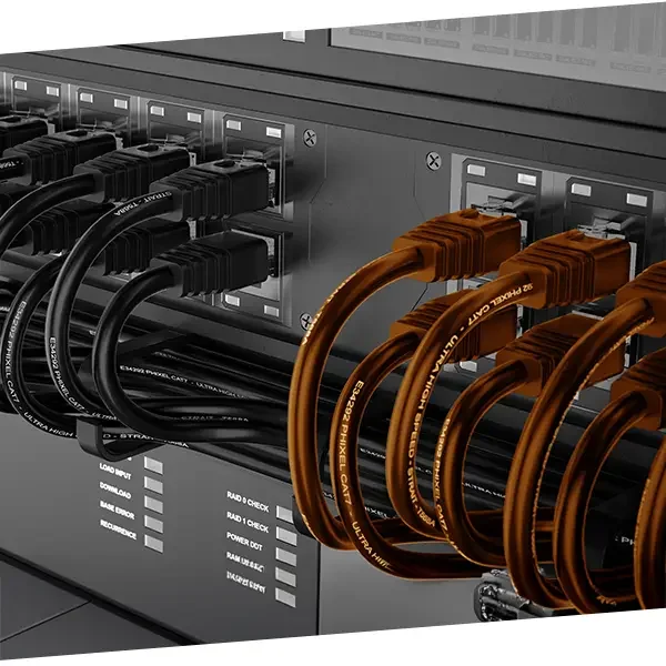 Close-up of server rack with black and orange Ethernet cables connected to ports.
