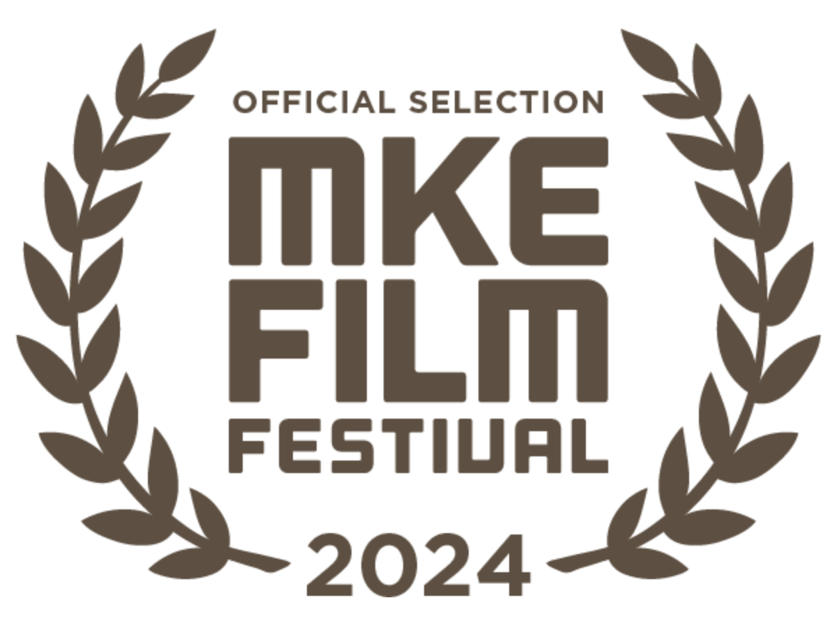 Laurel wreath surrounding text that reads 'Official Selection MKE Film Festival 2024'.