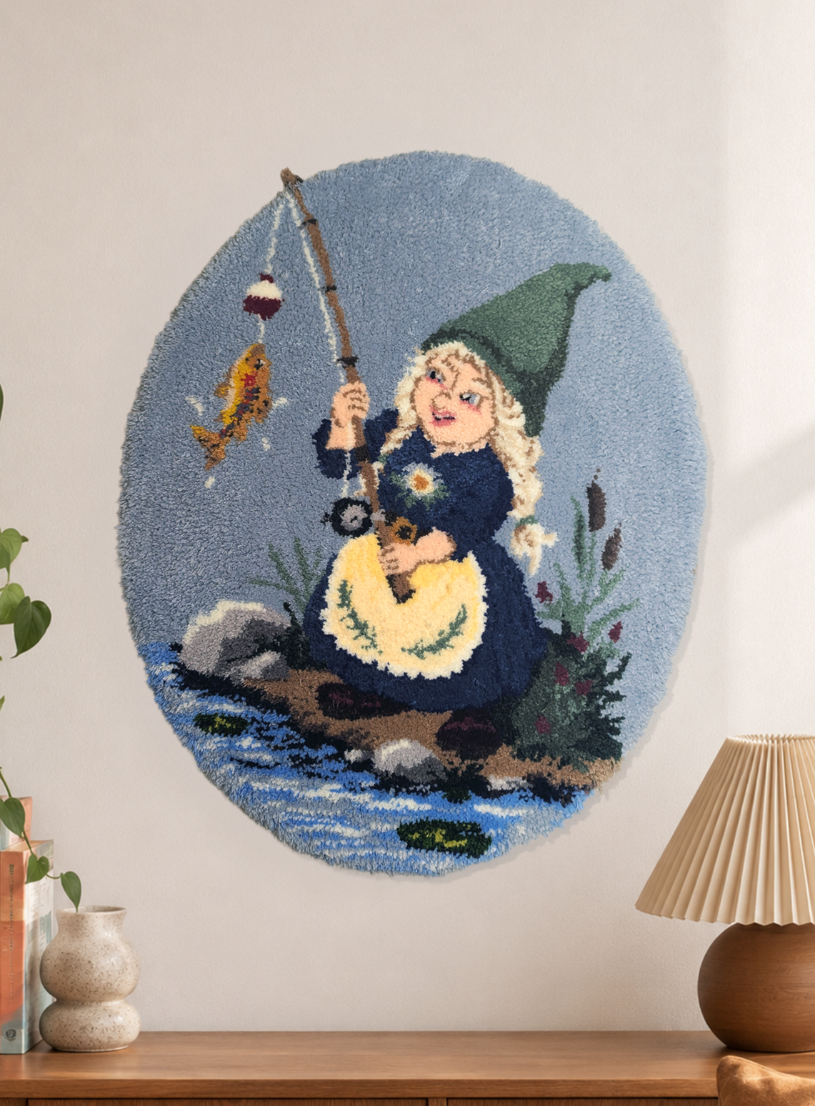 Handmade tufted fishing gnome rug imagining the secret lives of female garden gnomes. Original whimsical fibre artwork inspired by folklore, lakes, and cottage life.