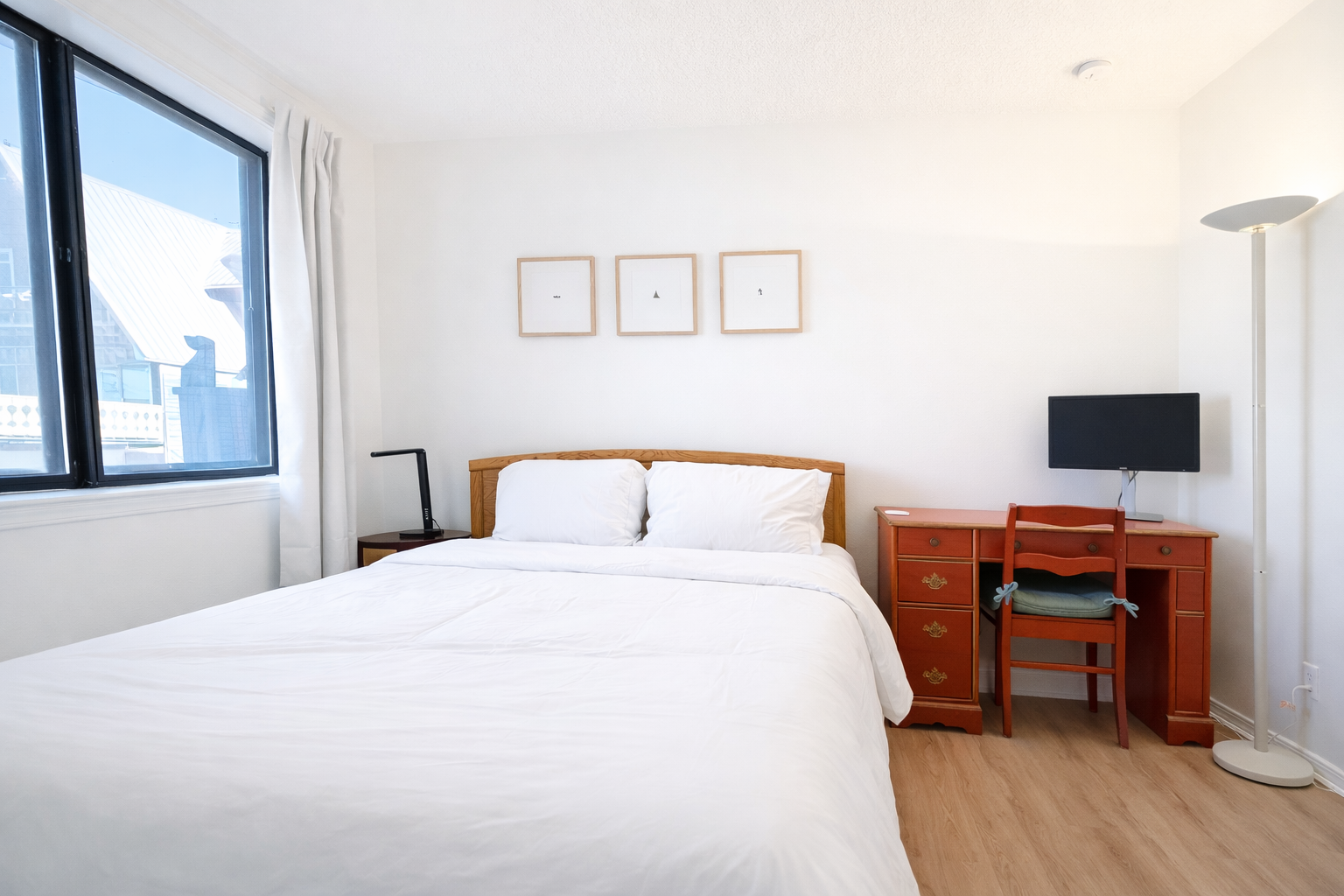 Bedroom 1 - Queen Bed with Workstation 
