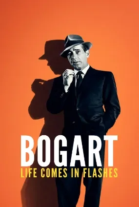 Black and white photo of a man in a suit and fedora hat against an orange background with the text 'Bogat' and 'Life Comes in Flashes'.