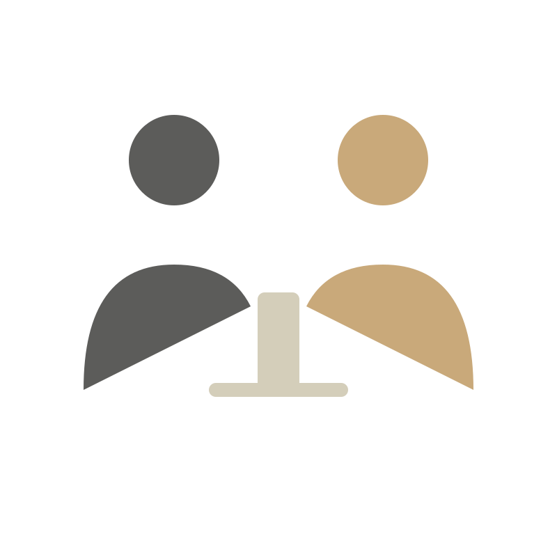 Icon of two people sitting at a desk with a microphone in front of them, suggesting a podcast or interview setting.