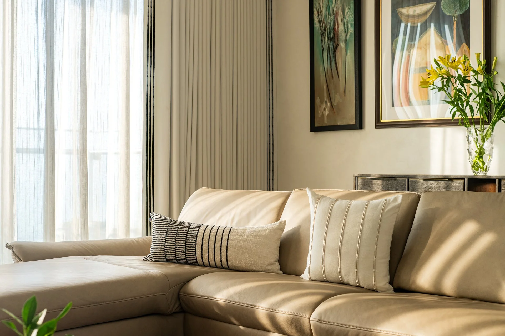 This is a residential home designed by Essajees Atelier at 360 West, Worli. Soft furnishings like Drapes, cushions and bedspreads designed by The Pink Champa
