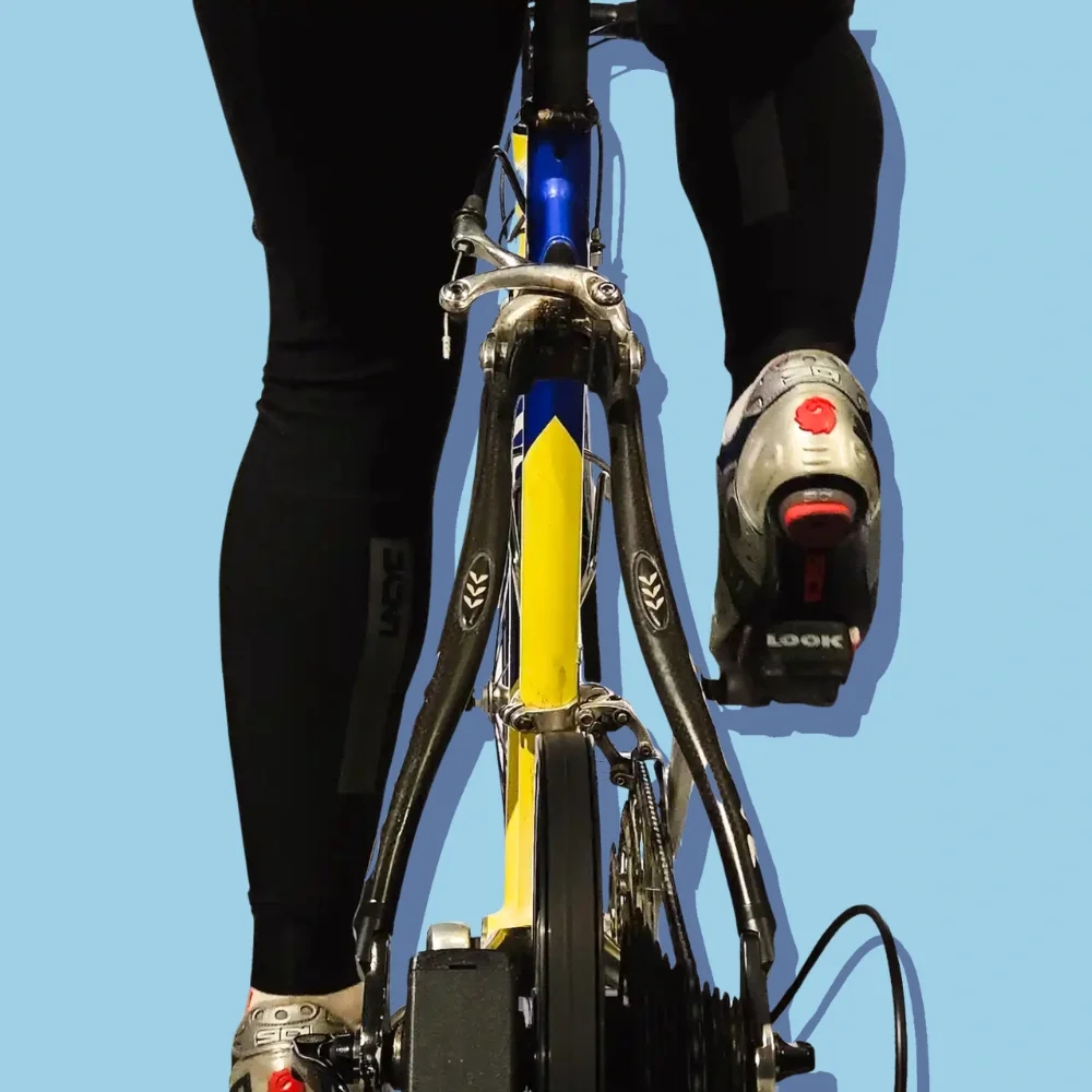 Close up of a cyclist pedaling on a trainer