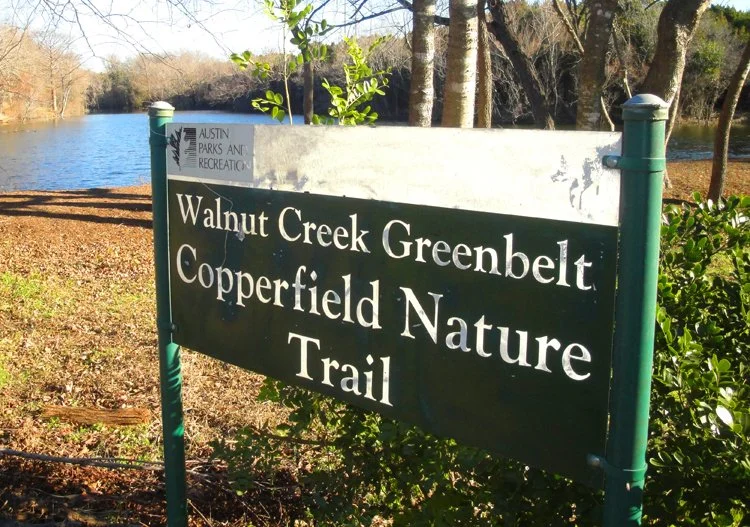 Trail sign and pond blakeney.jpg