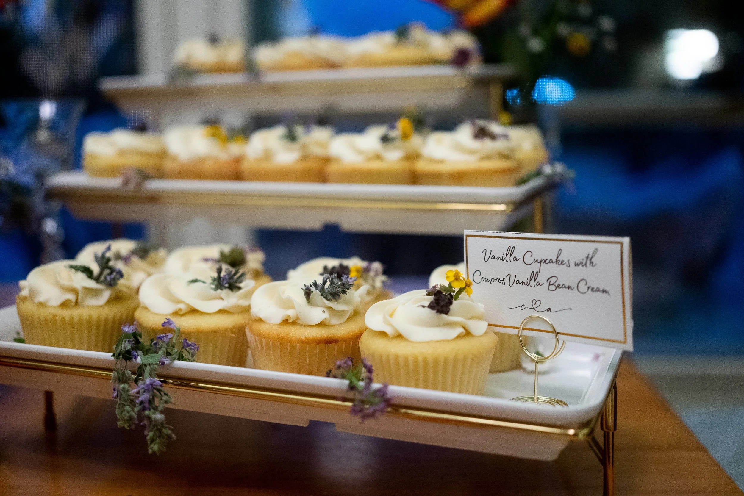 vanilla cupcakes with edible flowers
