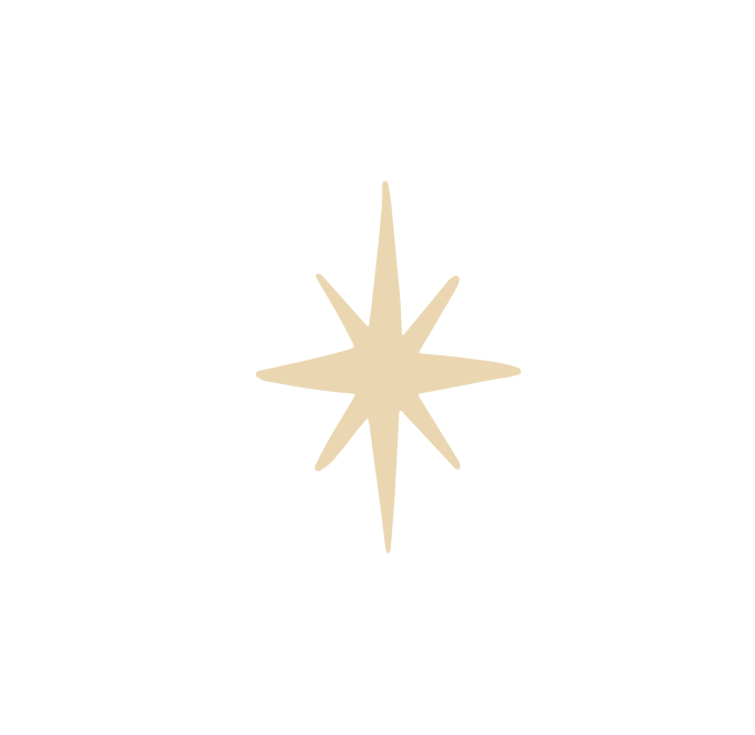 A gold or beige star-shaped ornament with eight points on a black background.