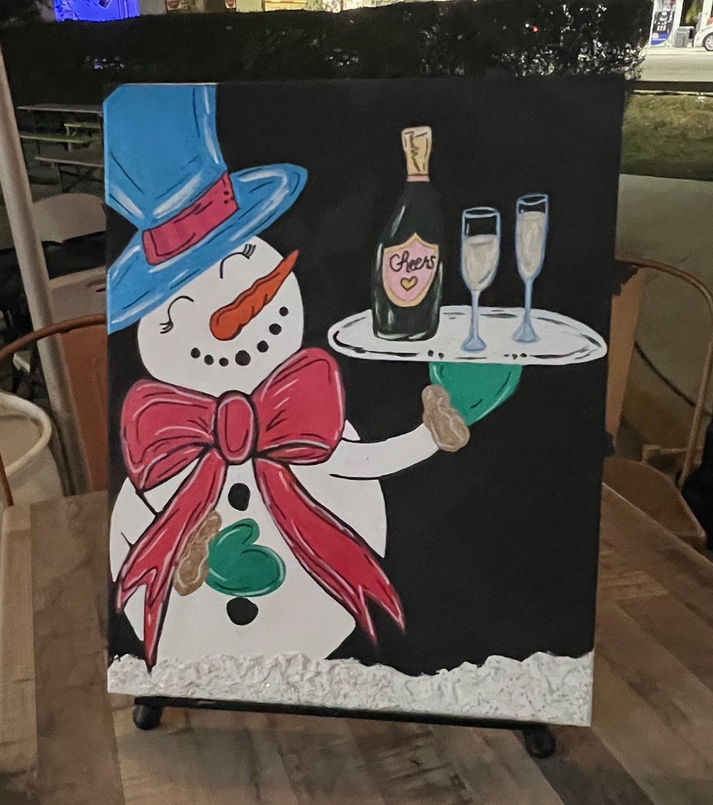 Painting of a snowman with a blue hat, red bow tie, and a carrot nose, holding a tray with a champagne bottle labeled 'Cheers' and two flute glasses.