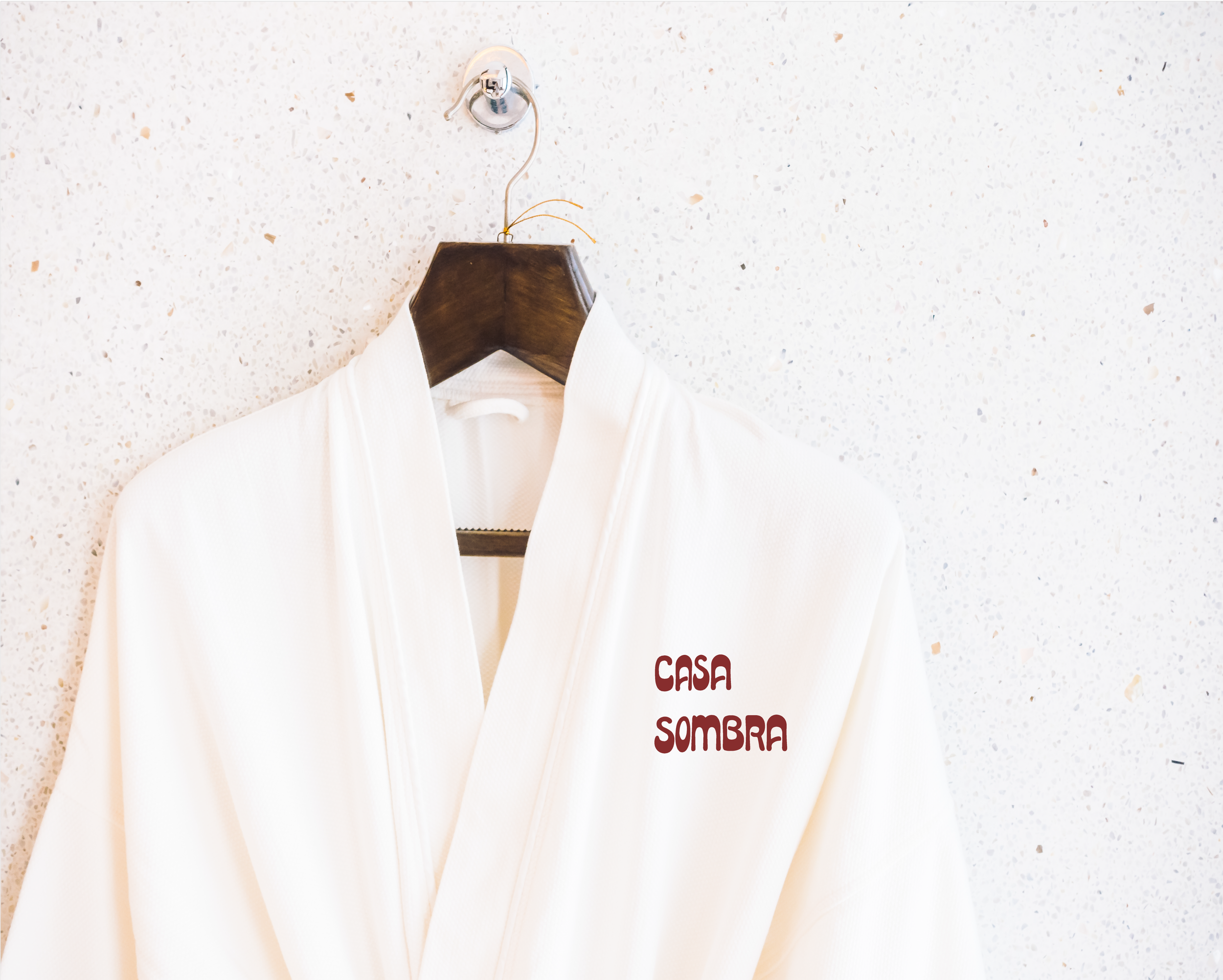 Luxury bathrobe mockup showcasing logo embroidery.