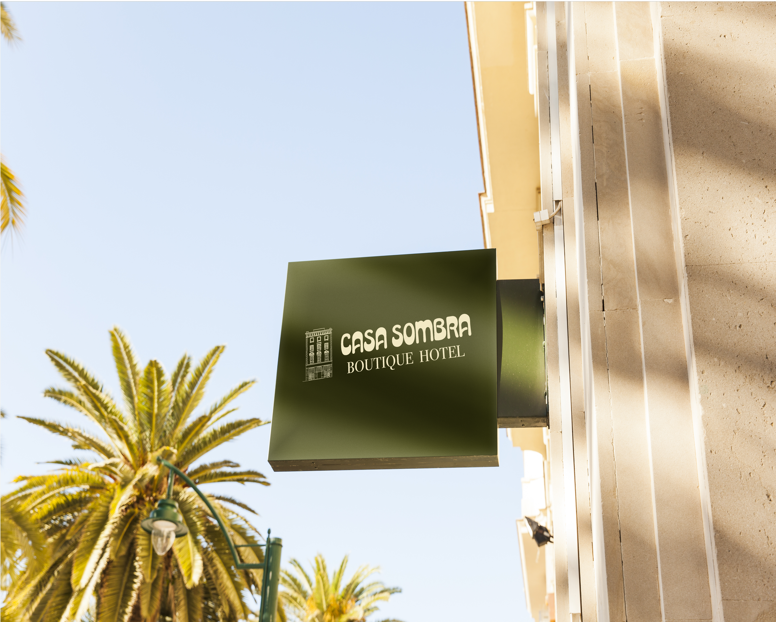 Modern exterior signage mockup for boutique hotel with minimalist logo design.