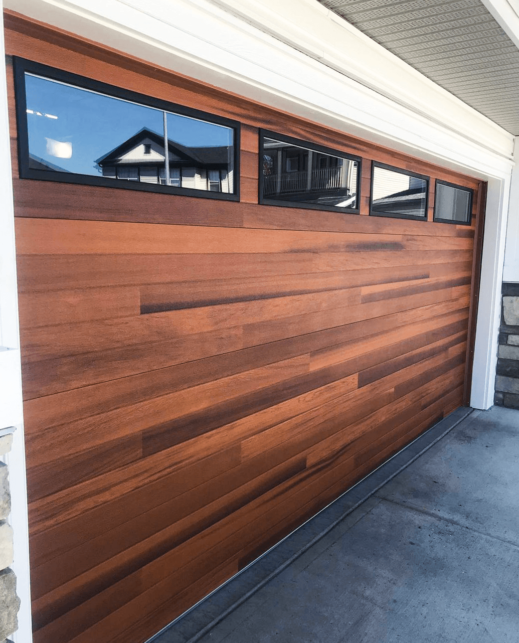 Plank Garage Door with Windows on White House