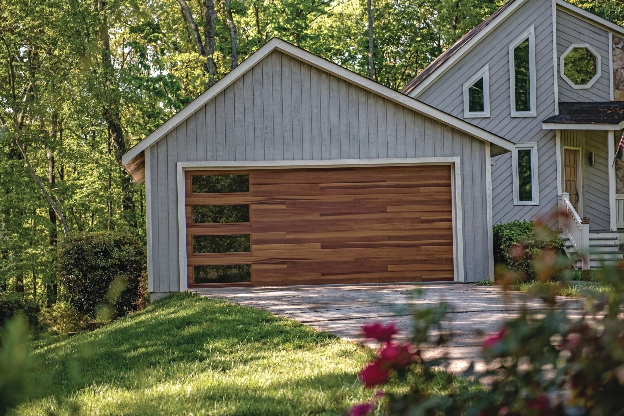 Plank Garage Door on Gray House