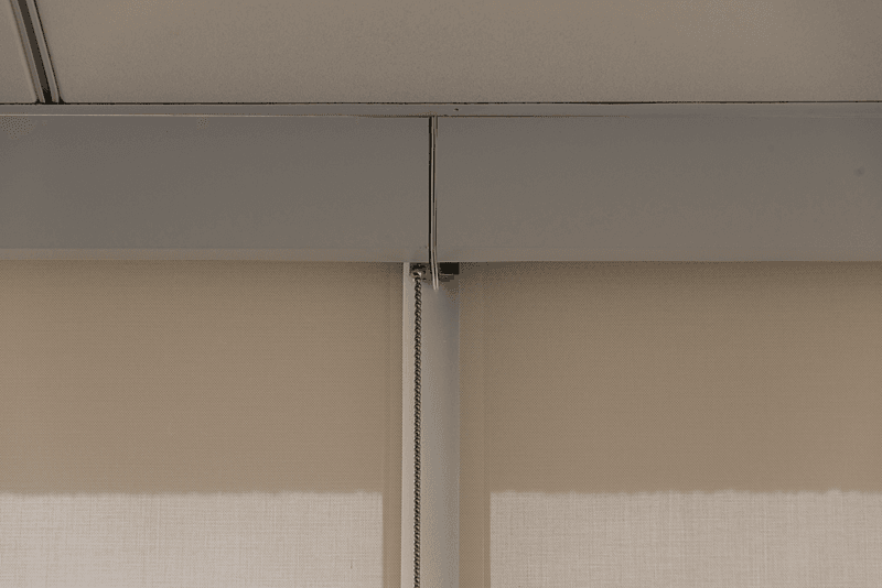 Fascia on a white Roller/Solar shade in an office building. Lansing Michigan