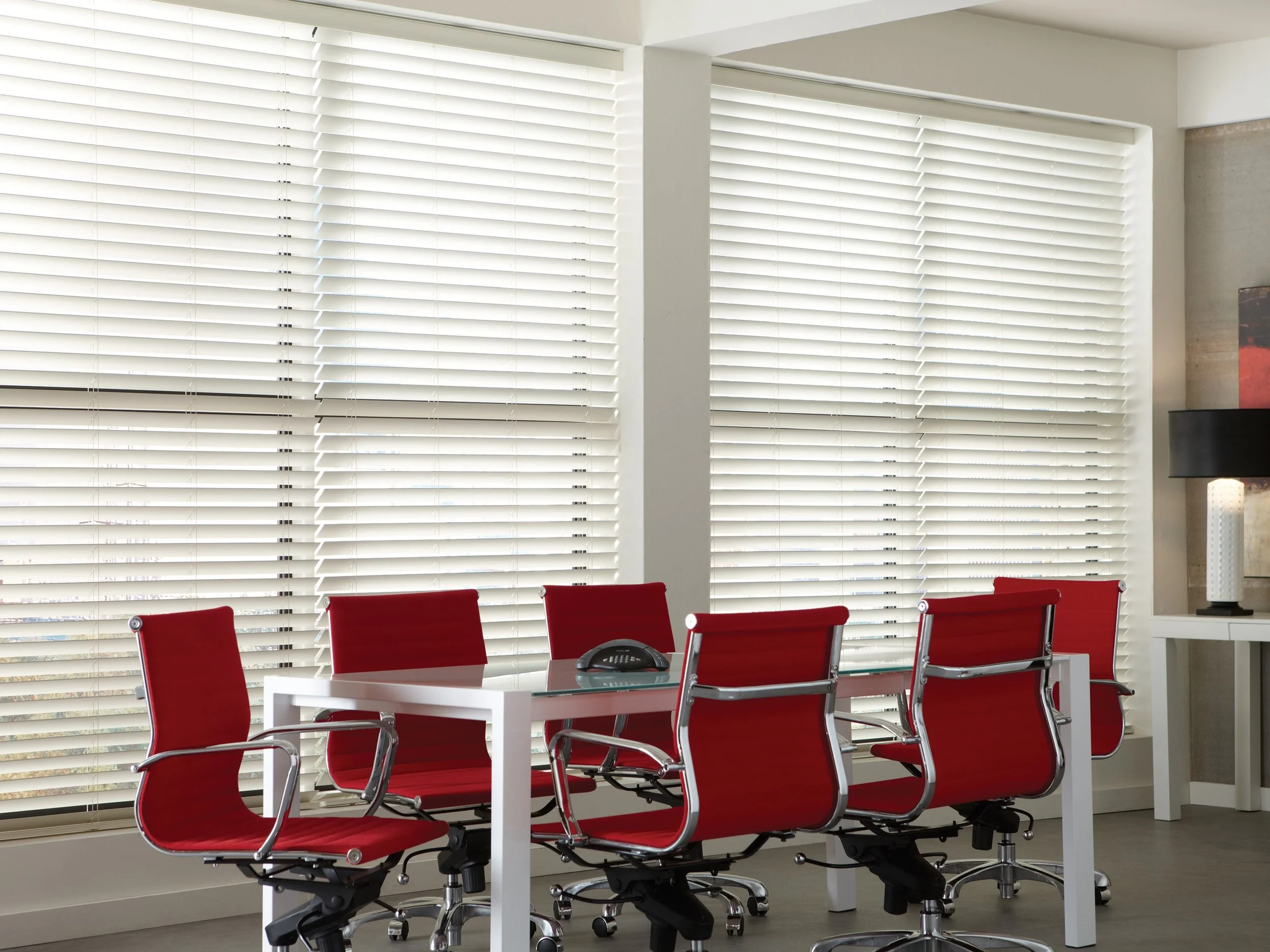 cordless white faux wood and mini blinds in an office