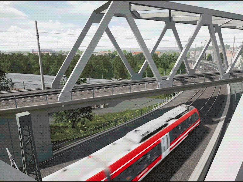 高速鉄道が高速で橋の下を通過している様子。