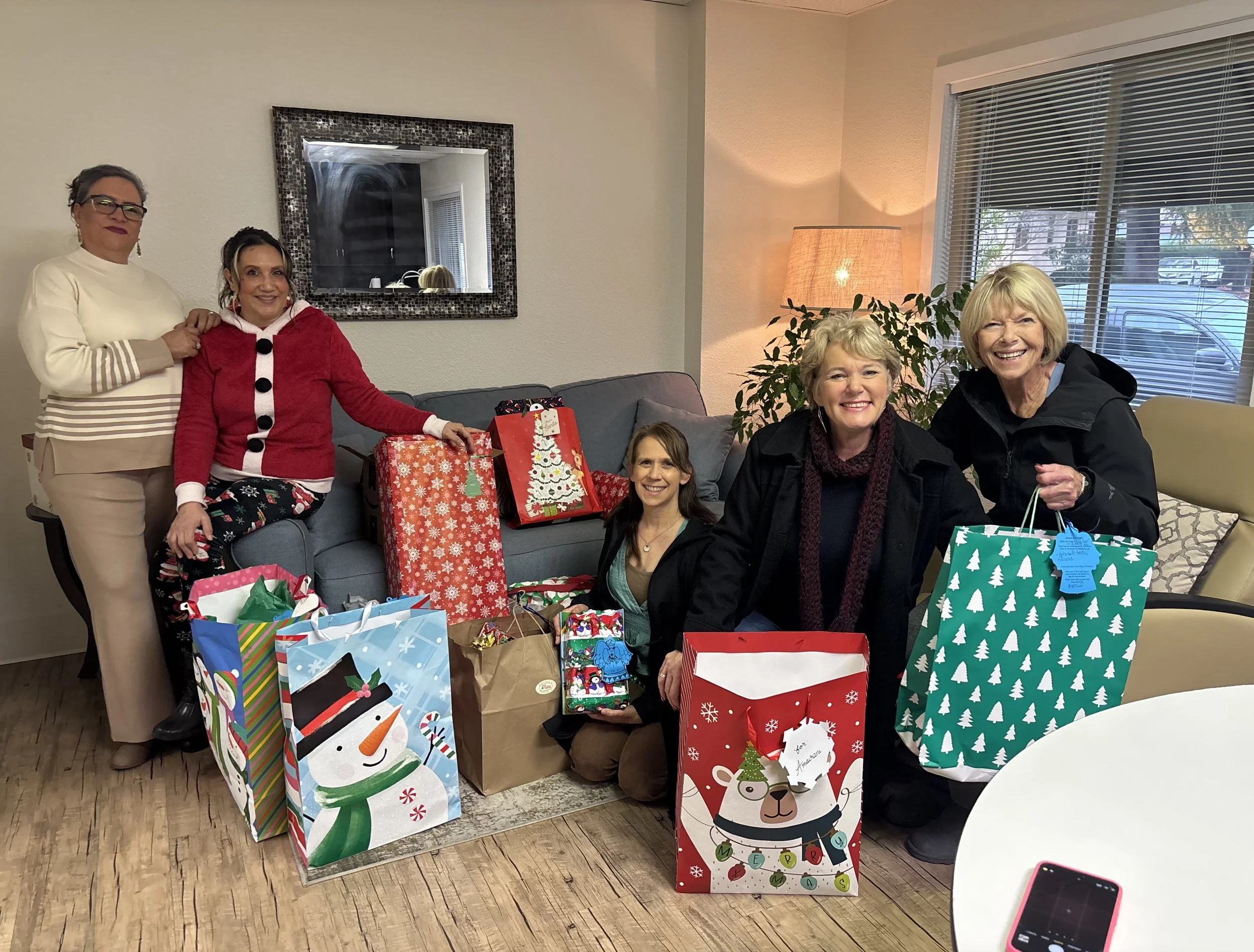 Delivering Angel Tree gifts to Kidz Community. 